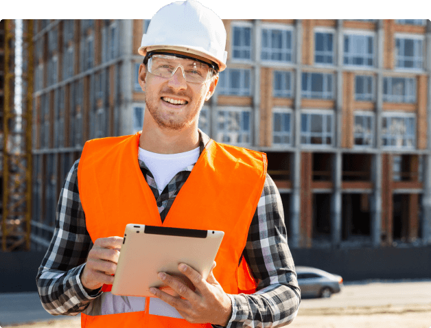 Construction Worker With Project Schedule